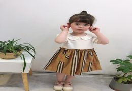 Summer new kids plaid stripe dress 2020 new girls doll lapel short sleeve pleated dress children ruffle double pockets princess dr3064171