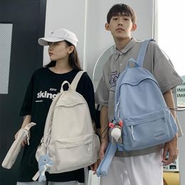 School Bags Solid Color Fashion Women Backpack Cute Pendant Bag For Boys Girls Canvas Large Capacity Laptop Couple Backpacks 2021257C