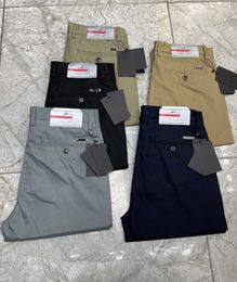 2024 primavera estate nuovi pantaloni di marca pantaloni da uomo d'affari in materiale elasticizzato confortevole di alta qualità pantaloni firmati da uomo di lusso