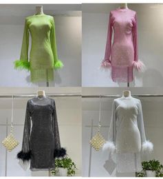 Casual Dresses Elegant Crystal See Through Fishnet Embellished Mini Pink Nightclub Dress Long Sleeve Feather Mesh5678145