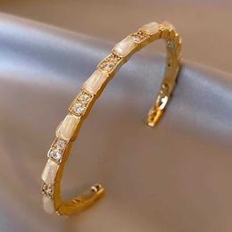 Kajia version cats eye stone snake bone bracelet with niche design adjustable opening micro inlaid with zircon snake shaped bracelet
