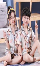 2020 New children039s Pyjamas Satin Silk Pyjamas Set Kids Baby Boy Girl Clothes Summer Short Sleeve Tops Shorts cartoon Sleepwe3825265