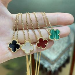 V Necklace S925 Sterling Silver Double sided Red Agate Four Leaf Grass Necklace Female 18K Rose Gold White Fritillaria Jade Medal Pendant Collar Chain