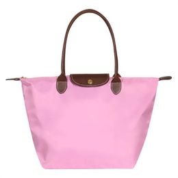 snap button foldable large capacity shopping bag designer weekend bag womens duffel bag designer mens fashion handbag pink totes luxury messenger bag lady handbags