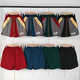 American Niche Trendy Rhude Embroidered Color Matching Tie Up Elastic Mens and Womens Casual Sports Shorts