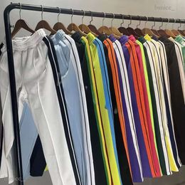 Designer Homens Pant Mulheres Imprimir Estilo Moda Long Plams Calças Casuais Mens Rainbow Palms Jogger Listras Cordão Anjos Tamanho Asiático 300