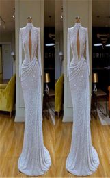 Gorgeous Silver Sequins Mermaid Evening Dresses Sexy Keyhole High Collar Long Sleeve Pleats Long Occasion Party Gowns Prom Wears B2328394