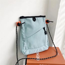 New Fashion Mini Waterproof Travel Bag Small Square Shoulder Bag Mens Handbag Unisex Crossbody Bag 240311
