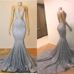 Silver Sequined Mermaid Long Prom Dresses High Neck Hollow Out Lace Appliqued Sexy Backless Formal Evening Gowns Long Court Train5136414