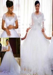 New Modest Vintage Lace 2020 Wedding Dresses Jewel With Short Sleeves Appliues Beaded White Tulle Wedding A Line Cheap Bridal Dres8771409
