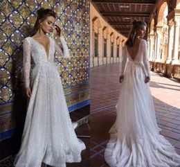 Beach A Line Wedding Dresses Long Sleeves Bling Sequins Appliqued Lace Dot Bridal Gowns Gorgeous Noble Backless Robes De 9093184