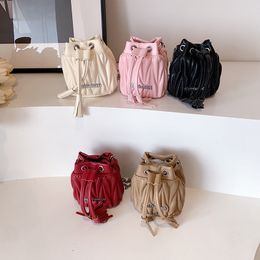 Girls metals letter applique bucket handbags kids quilted PU leather messenger bag children tassel drawstring one-shoulder bags Z7093