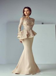 2020 Arabic Champagne Mermaid Evening Dresses Jewel Back Lace Appliques Long Sleeves Zipper Back Peplum Ruffles Plus Size Prom Par8926146