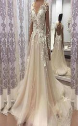 Sheer Illusion Long Sleeves Wedding Dresses Lace Appliques Natural Waistline Long Bridal Gowns Garden Formal Robe De Mariee15479144674619