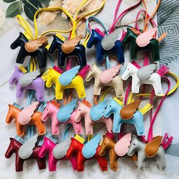 Key Rings Trendy Designer keychains PU Leather Wings Flying Horse Keychain H Pony Pendant Decoration Ladies Bag Backpack pendant Accessories