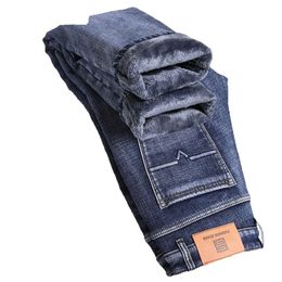 2024 Jeans caldi da uomo invernali addensare in pile pantaloni slim dritti morbidi elastici business casual in denim pantaloni maschili di marca blu grigio