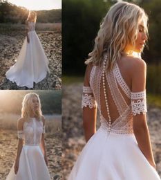 2022 Beautiful Pearls Bohemian Wedding Dresses See Though Top Empire Waist Shoulder Short Sleeves Romantic Lace Satin Aline Count8220606