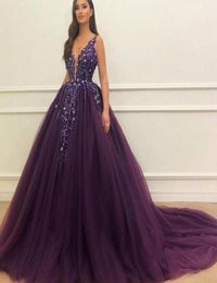 2022 Sexy Purple Beaded Ball Gown Quinceanera Dresses Appliques Sequins Deep V Neck Tulle Evening Party Dresses Prom Gown BC109687650460