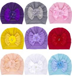 Newborn Baby Solid Colour Pearl Bows Elastic Turban Kids Beanie Hat Infant Bowknots Caps Fashion Headwear9014288