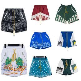 Top quality designer rhude shorts summer fashion beach shorts Mens Womens street wear red blue black loose ligthweight rhude shorts mens short gym shorts xva