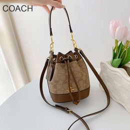 Hot European and American Designer Bag Factory Online Wholesale Retail New Boutique Old Flower Bucket Bag for Womens Printed Crossbody Fashionable Versatile Bag