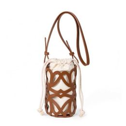 HBP Non-Brand Minimum MOQ Wholesale Summer Beach Clutch Canvas Drawstring Messenger Bag New Design Brown Hollow Out PU Leather Bucket