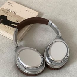 Instagram-Blogger Amerikanische Retro-Kopfhörer Kopfhörer Tragen Sie kabellose Bluetooth-Kopfhörer mit Geräuschunterdrückung, um Fotos zu machen, verzierte kompakte Damenkopfhörer