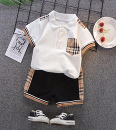 2021 Summer Baby kids plaid outfits boys cotton short sleeve Tshirtshorts 2pcs children designer clothing A56525261477