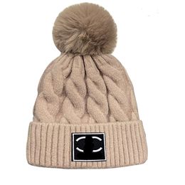 Foreign trade explosions outdoor warm hats knitted wool hats cold hats coarse letters marked spot wholesale fur ball caps.