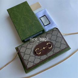 2024 new Top Designer bag men and women Vintage canvas leather Stylish mini crossbody Classic chain handbags Portable mobile phone