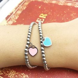 Designer selling titanium steel tiffay and co peach heart bracelet womens beads stainless love hand Jewellery