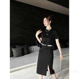 designer P Family 23 SpringSummer New Triangle Decorative Top+Drawstring Skirt Air Layer Fabric Set G2ID