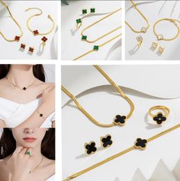 Gold Plated Jewelry Sets Titanium Steel Double Sided Four-leaf Clover Cleef Rings Bracelet Earrings Necklace 4pcs/set Designer Flowers Pendant Gifts