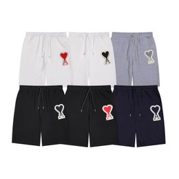 SS New Mi Shorts Big Love Emblem Embroidered Patch for Men and Women Couples Loose and Casual Versatile Sports Pants 5/4