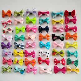 100PCS lot Whole handmade Colourful mix small bows Dog Puppy cat Pet Bow Hairpins Hair Clips Grooming barrette Apparel accessor243S