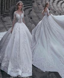 2019 Luxurious Long Sleeve Sheer Neck Ruffle Applique Lace Wedding Dresses Hollow Zipper Back Long Tail Bridal Gown Ship8850821