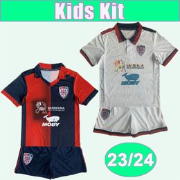 23 24 Cagliari Calcio Kids Kit Soccer Jerseys PAVOLETTI MANCOSU LAPADULA VIOLA DEIOLA ZAPPA NANDEZ Home Away Football Shirts
