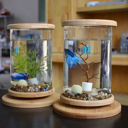 1pcs Glass Betta Fish Tank Bamboo Base Mini Fish Tank Decoration Accessories Rotate Decoration Fish Bowl Aquarium Accessories Y200206x