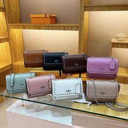 Designer Bags Are 90% Off Cheaper Womens Bag 2024 New Fashion Rivet Small with Internet Red Texture One Shoulder Crossbody