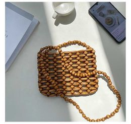 HBP Non-Brand 2024 Summer Korean Version Braided Design Crossbody Bag Small New Wooden Bead Sling Womens Shoulder Fashion Hollow