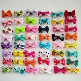 100PCS lot Whole handmade colorful mix small bows Dog Puppy cat Pet Bow Hairpins Hair Clips Grooming barrette Apparel accessor209B