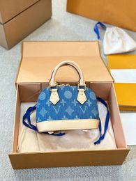 Limited edition Blue cowboy Shell bag leather shoulder bag clutch handbag luxury brand designer bag crossbody package messenger bags M53152