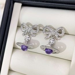 viviennes westwood earrings Dowagers three-dimensional purple planet Saturn earrings with high-end diamond bow earrings earrings for women