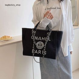 Factory Selling 50% Discount Brand Designer New Handbags Shangpin New Trendy Canvas Pearl Beach Bag of Ladle Shoulder Diagonal Straddle Tote Womens