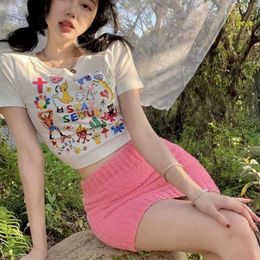 Fun cartoon print front shoulder short T-shirt for women in summer new slim fit and slimming appearance spicy girl short sleeved open navel top for women