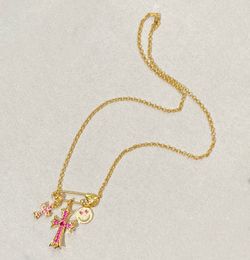 2024 Luxury quality charm cross design with fuchsia Colour diamond in 18k gold plated have stamp smile shape PS3154B