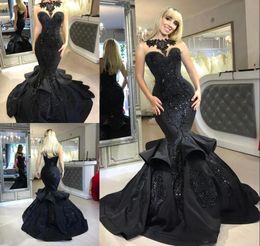 2018 Dubai Arabic Black Mermaid Prom Dresses Beads Sequined Ruffles Floor Length Applique Formal Dresses Evening Wear Evening Dres8381404