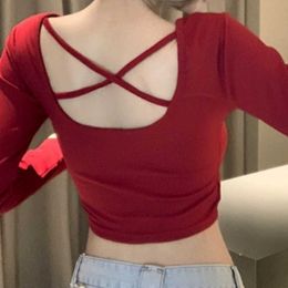 New Years style backless inner long sleeved T-shirt for women with pure desire tight fitting short style with exposed navel unique sweet and spicy design sense top