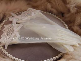 Vintage Ivory Waist Length Bridal Gloves Full Fingers Sheer Wedding Gloves Bowknot Beading Lace Bridal Gloves Rhinestone Bridal Ha7428878