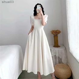 Basic Casual Dresses Dresses for Women 2023 Spring New White Dress Womens White Skirt Waist Slimming Temperament Over-the-knee Long Skirt SummerL2403